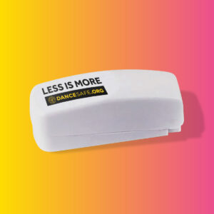 A photo of the DanceSafe branded Less is More pill cutter.