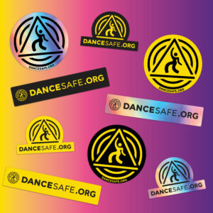 Collection of nine different DanceSafe logo sticker designs, featuring black, yellow, and holographic versions in circular, rectangular, and arch shapes, all labeled “DANCESAFE.ORG.”